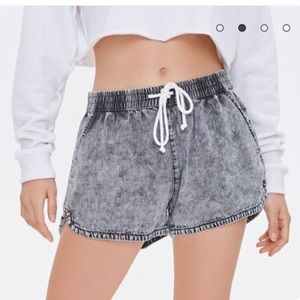 Distressed black shorts